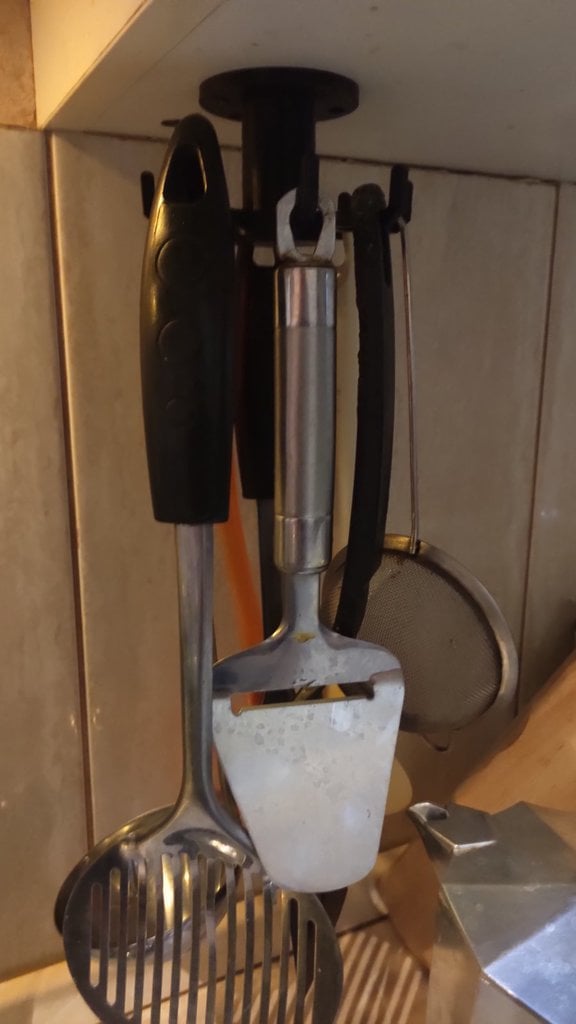 Soporte giratorio colgante para utensilios de cocina