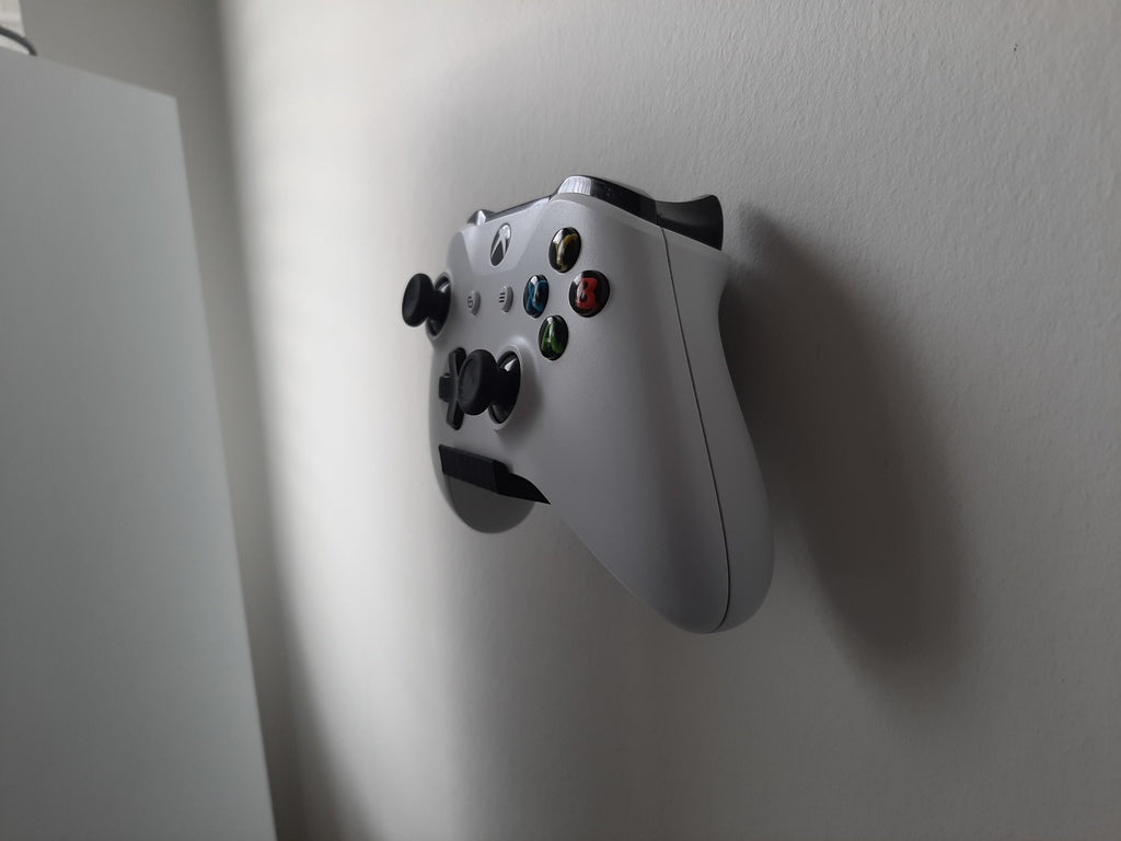 Soporte de pared para controladores de Xbox One