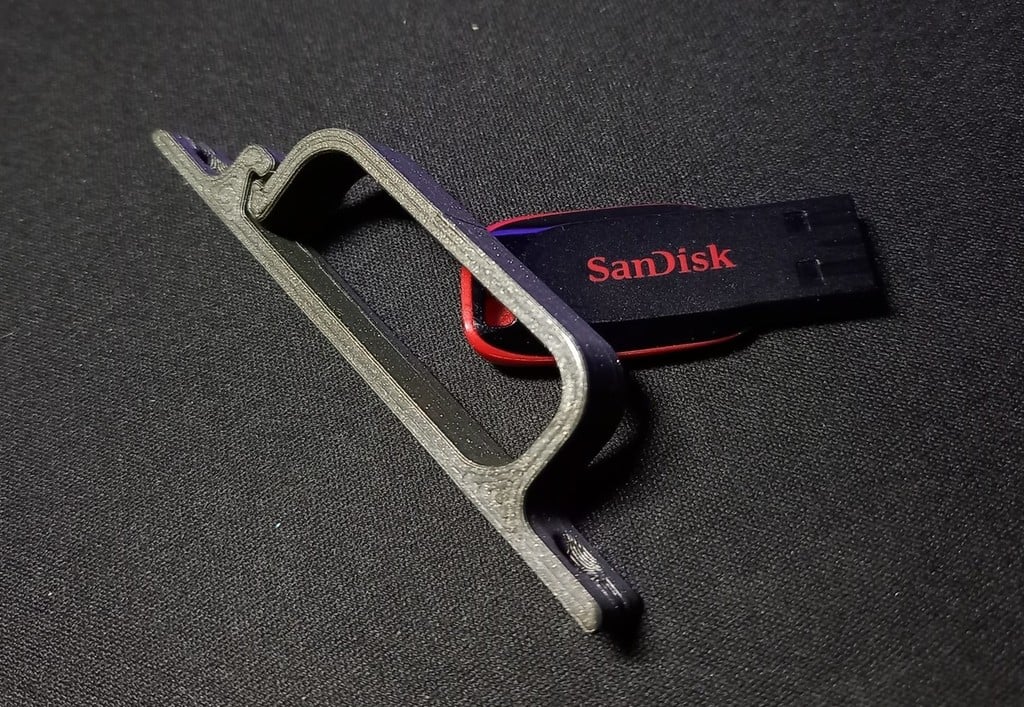 Gancho para gestión de cables debajo del escritorio