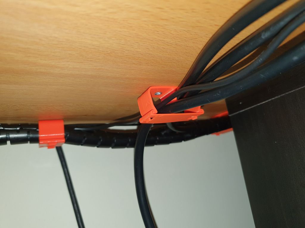 Abrazadera de gestión de cables para escritorio