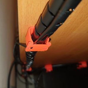 Abrazadera de gestión de cables para escritorio