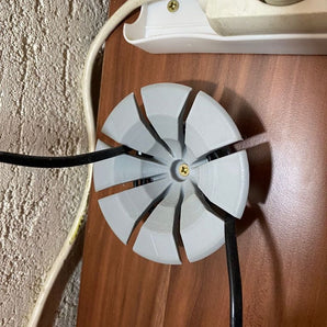 Enrollador de cable con diseño de pétalos