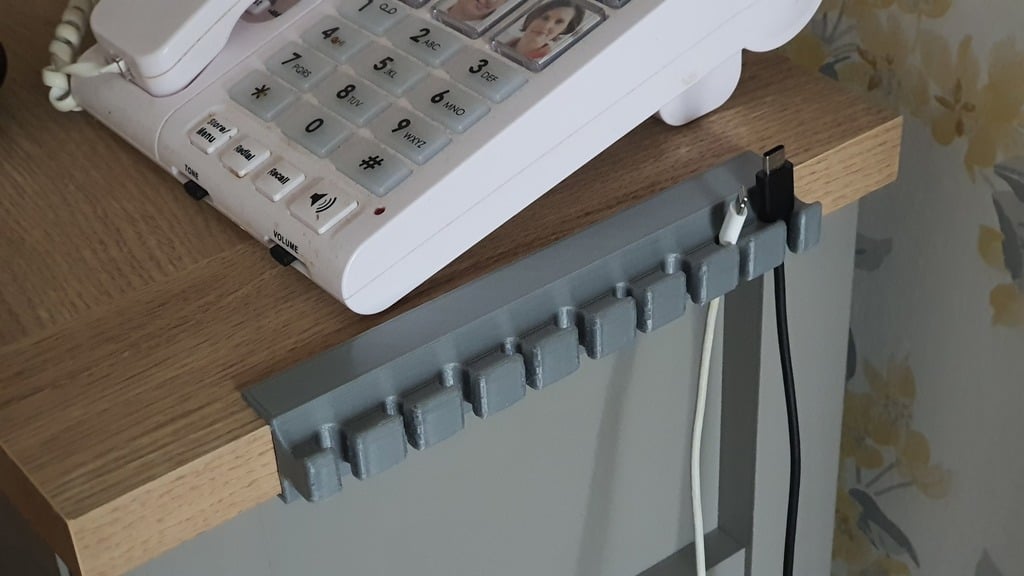 Soporte para cables para mesa Next Malvern Eg (borde de 25 mm)