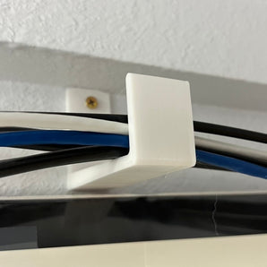 Soporte de pared para cables, tuberías y alambres