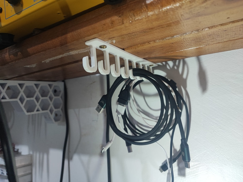 Soporte de cable / gancho debajo de la estantería