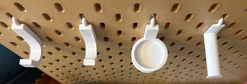 Ganchos personalizados para el tablero de clavijas SKÅDIS de IKEA