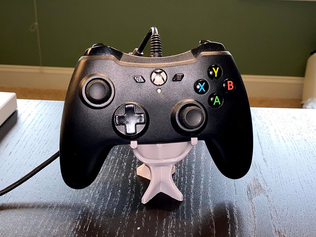 Elegante soporte para mando de Xbox con diseño generativo
