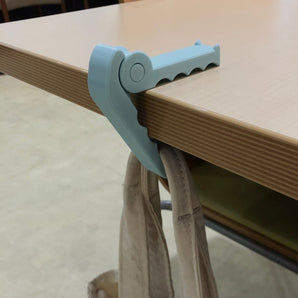 Gancho de mesa de cocodrilo portátil para bolsos