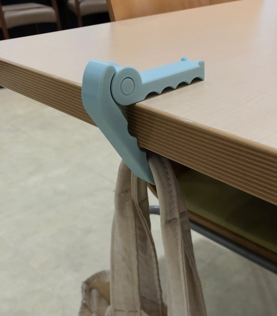Gancho de mesa de cocodrilo portátil para bolsos