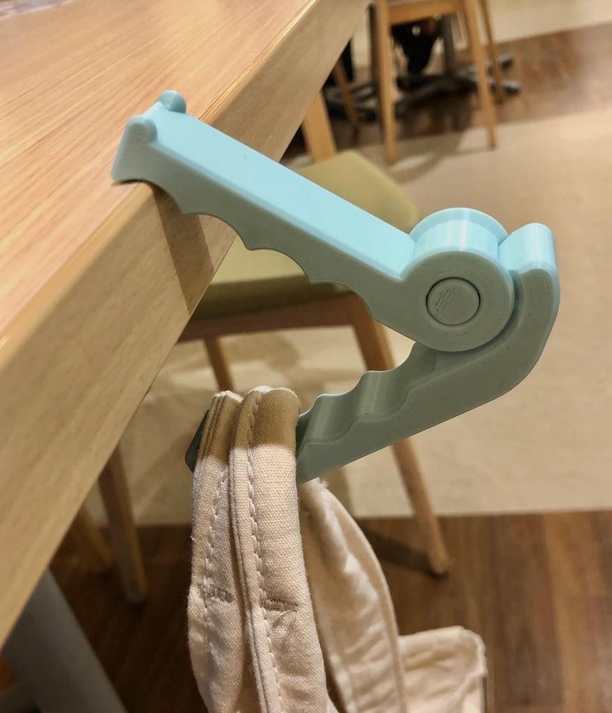 Gancho de mesa de cocodrilo portátil para bolsos