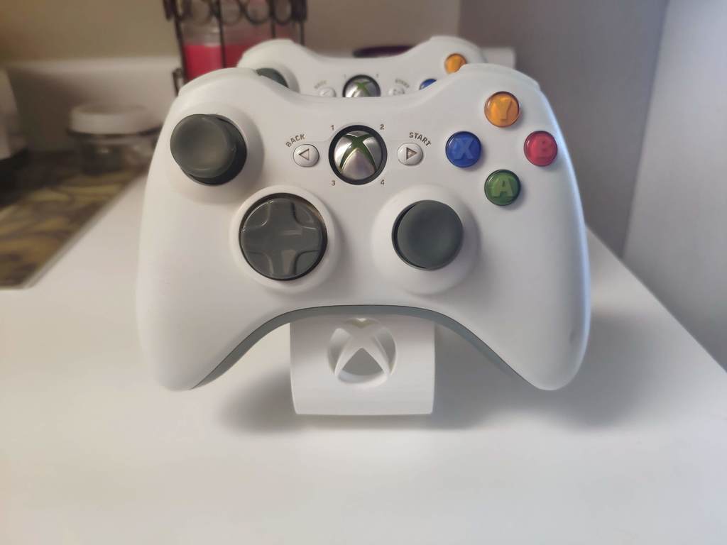 Base para controladores de Xbox 360 dual con logo