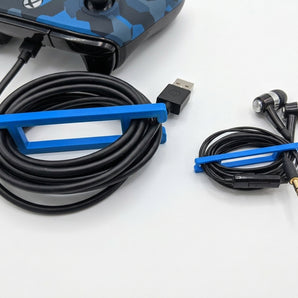 Enrollador de cable universal para juegos y USB