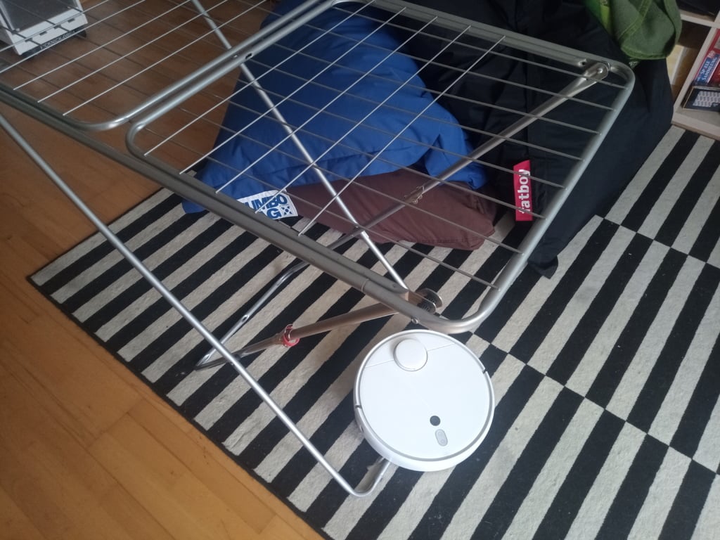 Protector para tendedero contra robot aspirador