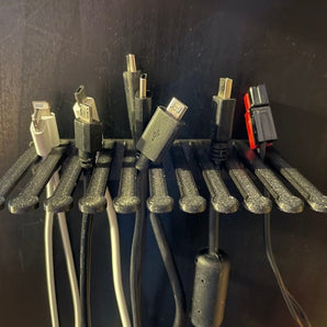 Pequeño soporte para cables para montaje en pared