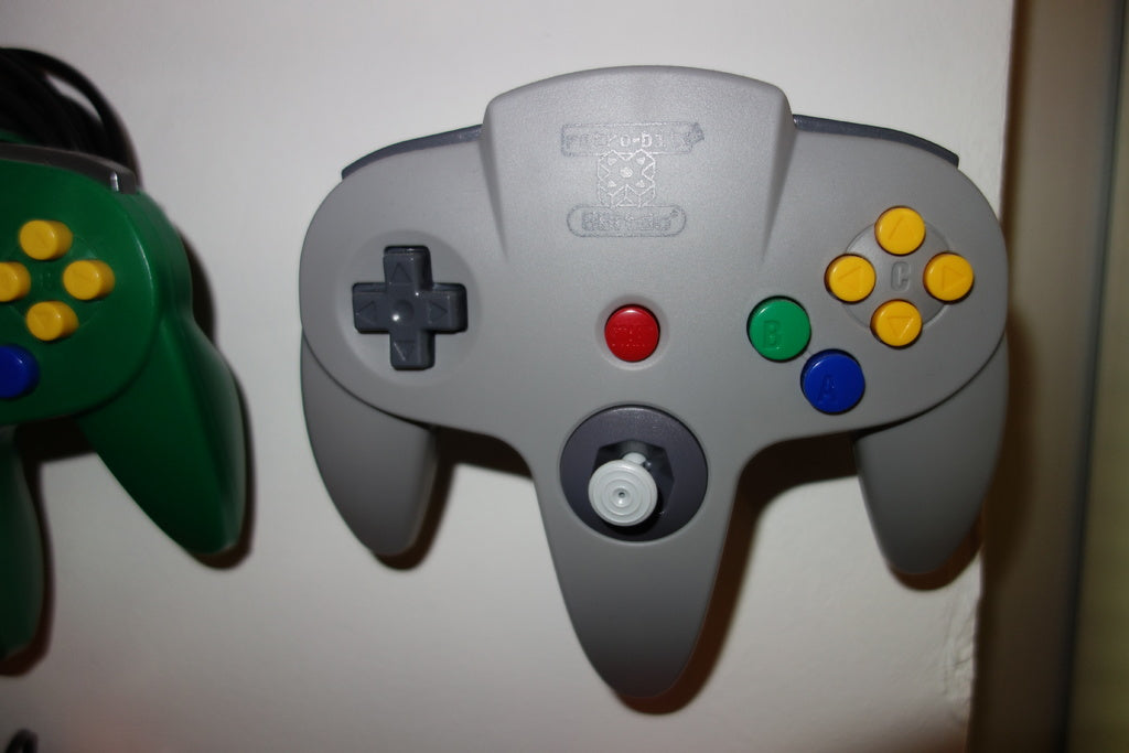 Soporte de pared para controlador 8bitdo X Retro-Bit 64