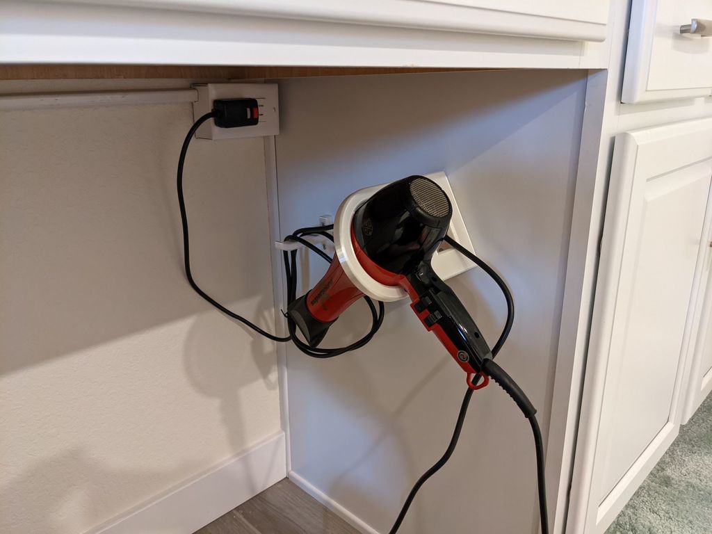 Soporte para secador de pelo para montaje lateral con gancho para cable