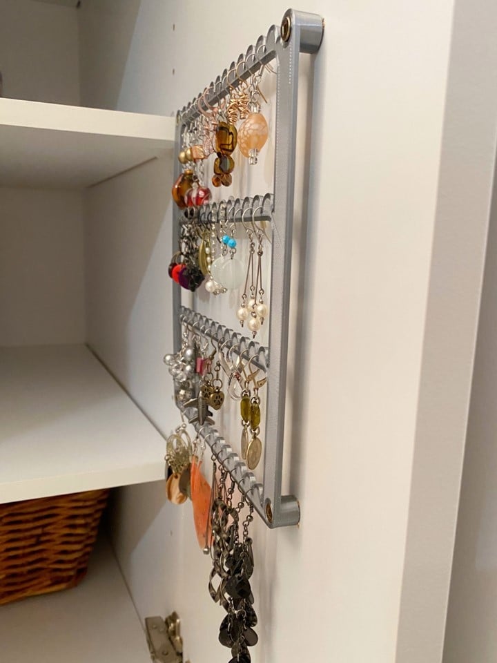 Organizador y colgador de pendientes de pared