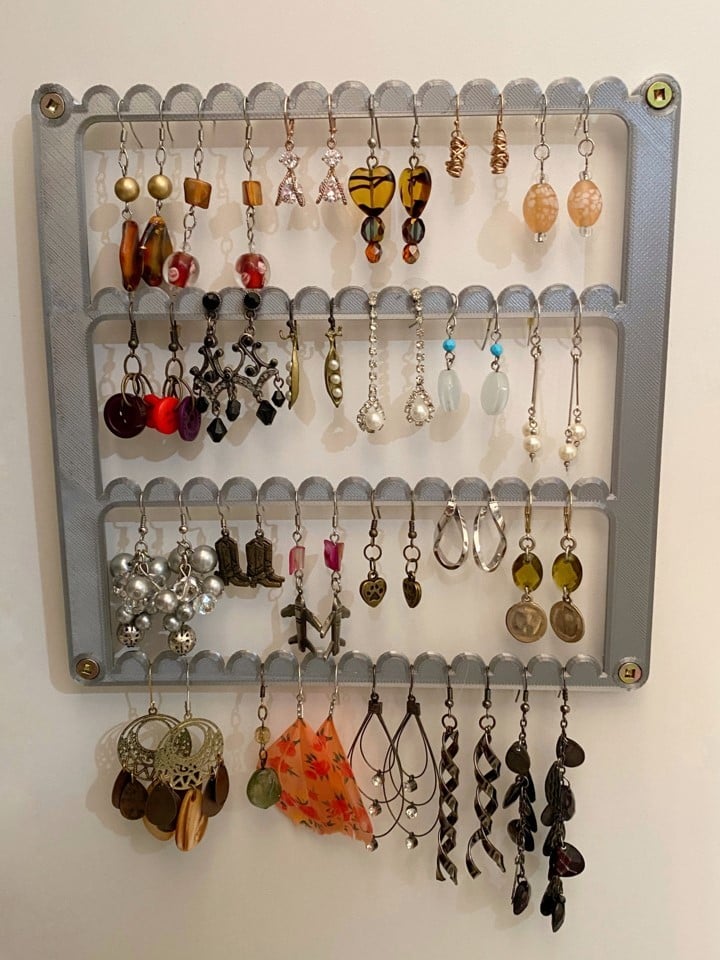 Organizador y colgador de pendientes de pared