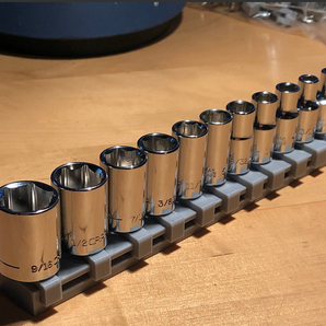 Riel organizador eficaz para vasos de 1/4"
