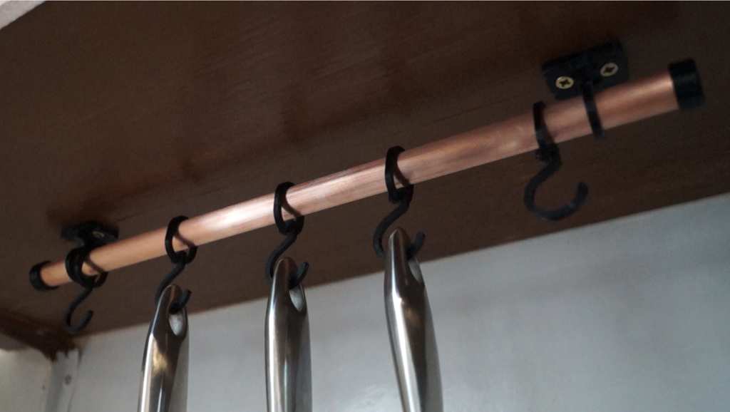 Colgador de cocina inteligente para ollas y sartenes