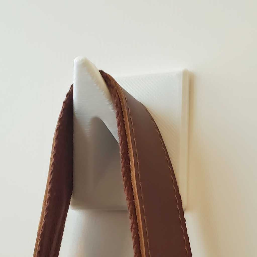 Ganchos de pared simples en tres tamaños (S, M, L)
