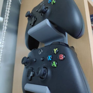 Soporte de pared doble para mandos de Xbox One