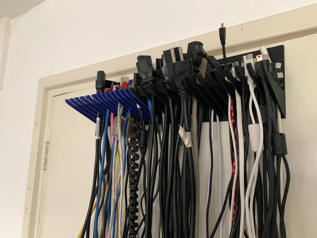 Soporte de cable sistema de colgar organizador