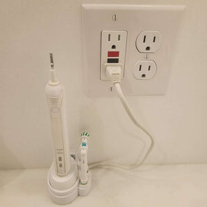 Soporte de pared Oral B para cargador de cepillo de dientes con gestión de cables