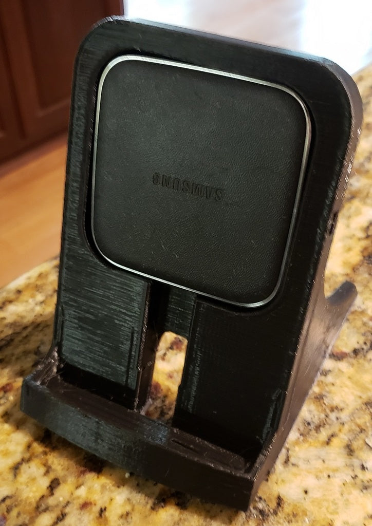 Soporte de carga para Samsung Galaxy Note 9 con funda Otterbox y cargador EP-PG900IBE.