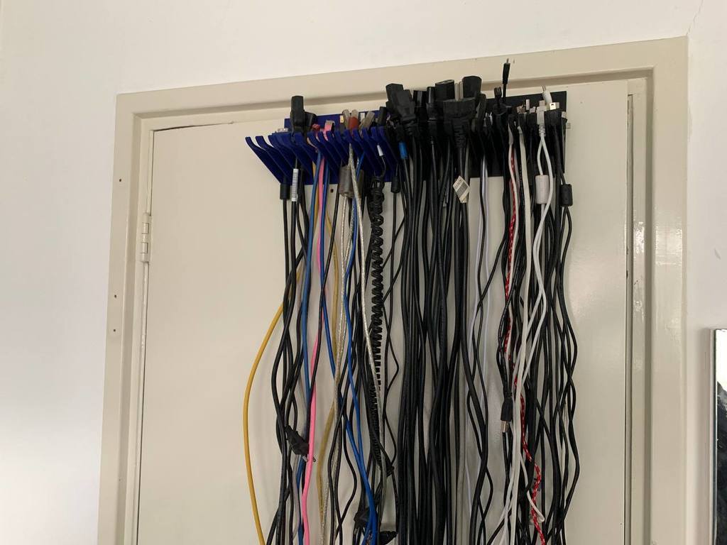 Soporte de cable sistema de colgar organizador