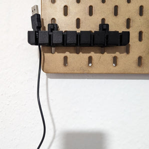 Soporte para cable USB Skadis