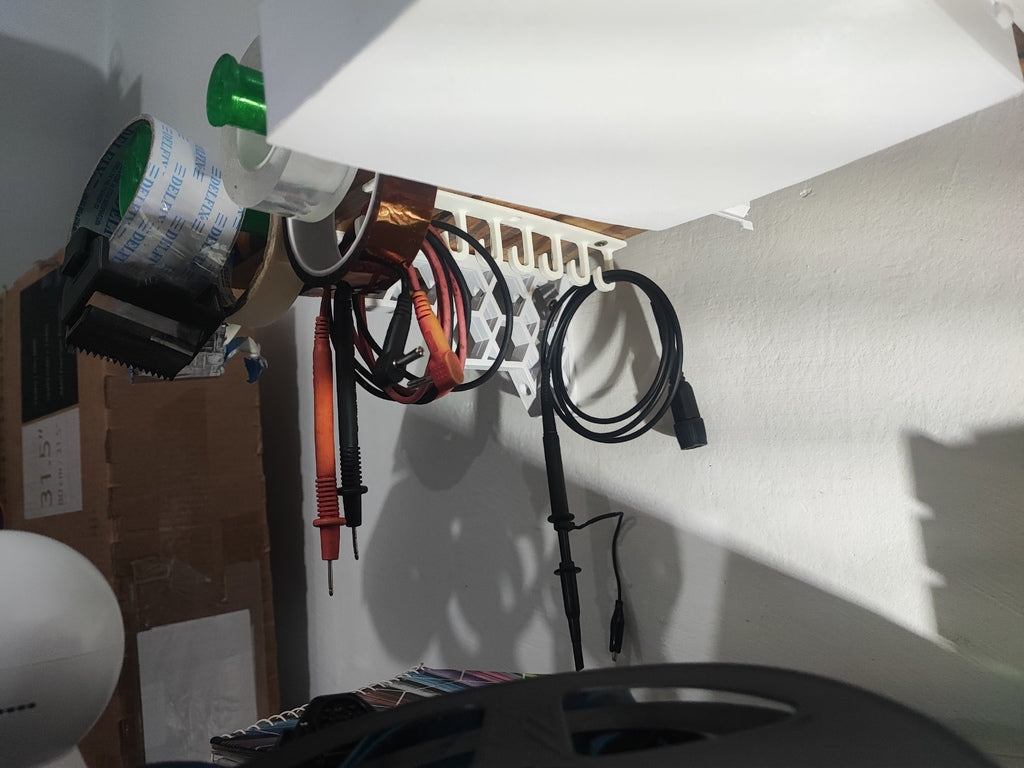 Soporte de cable / gancho debajo de la estantería