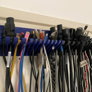 Soporte de cable universal para montaje en pared