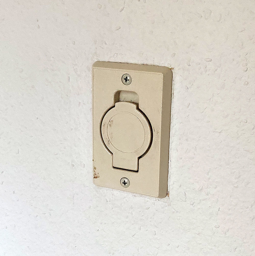 Placa de cubierta para toma de aspiradora central