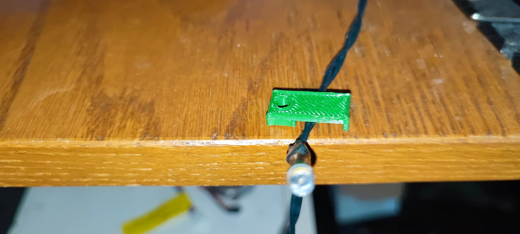 Tira LED y soporte para cables