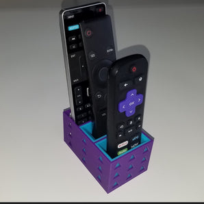 Soporte triple para mando a distancia con espacio para tres