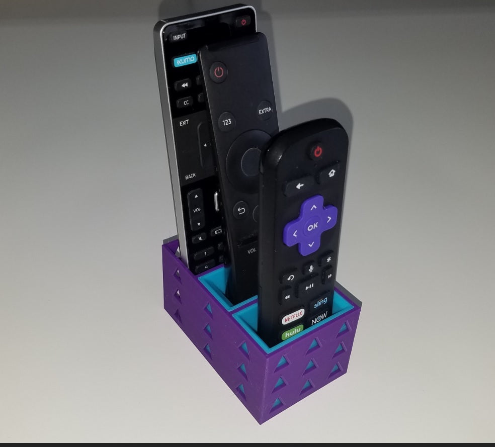 Soporte triple para mando a distancia