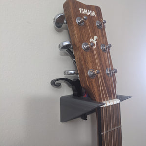 Montaje en pared para guitarra con soporte para accesorios
