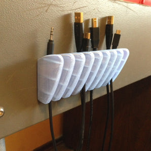 Soporte para cable USB
