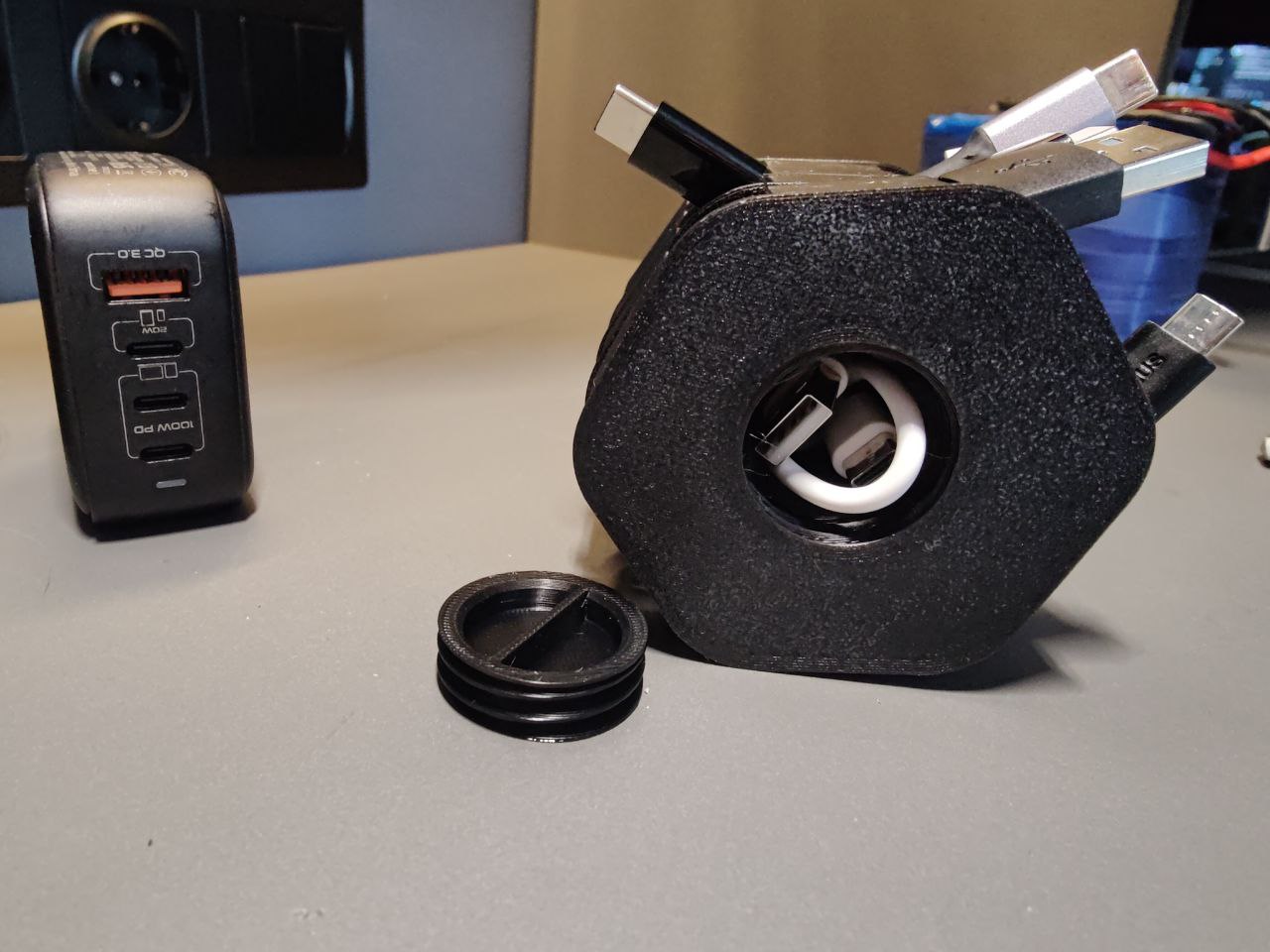 Soporte modular para cables de carga