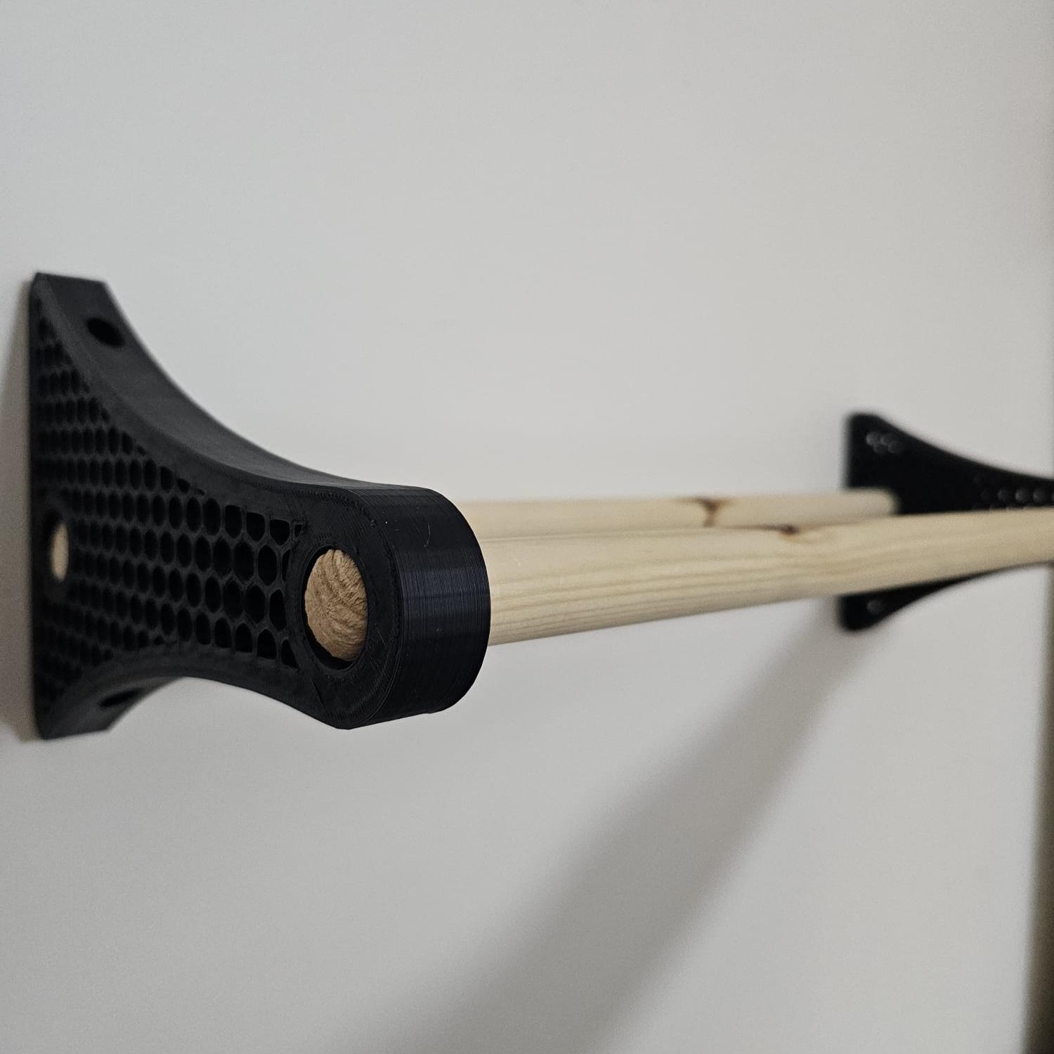 Soporte de pared para bobina de filamento con diseño hexagonal