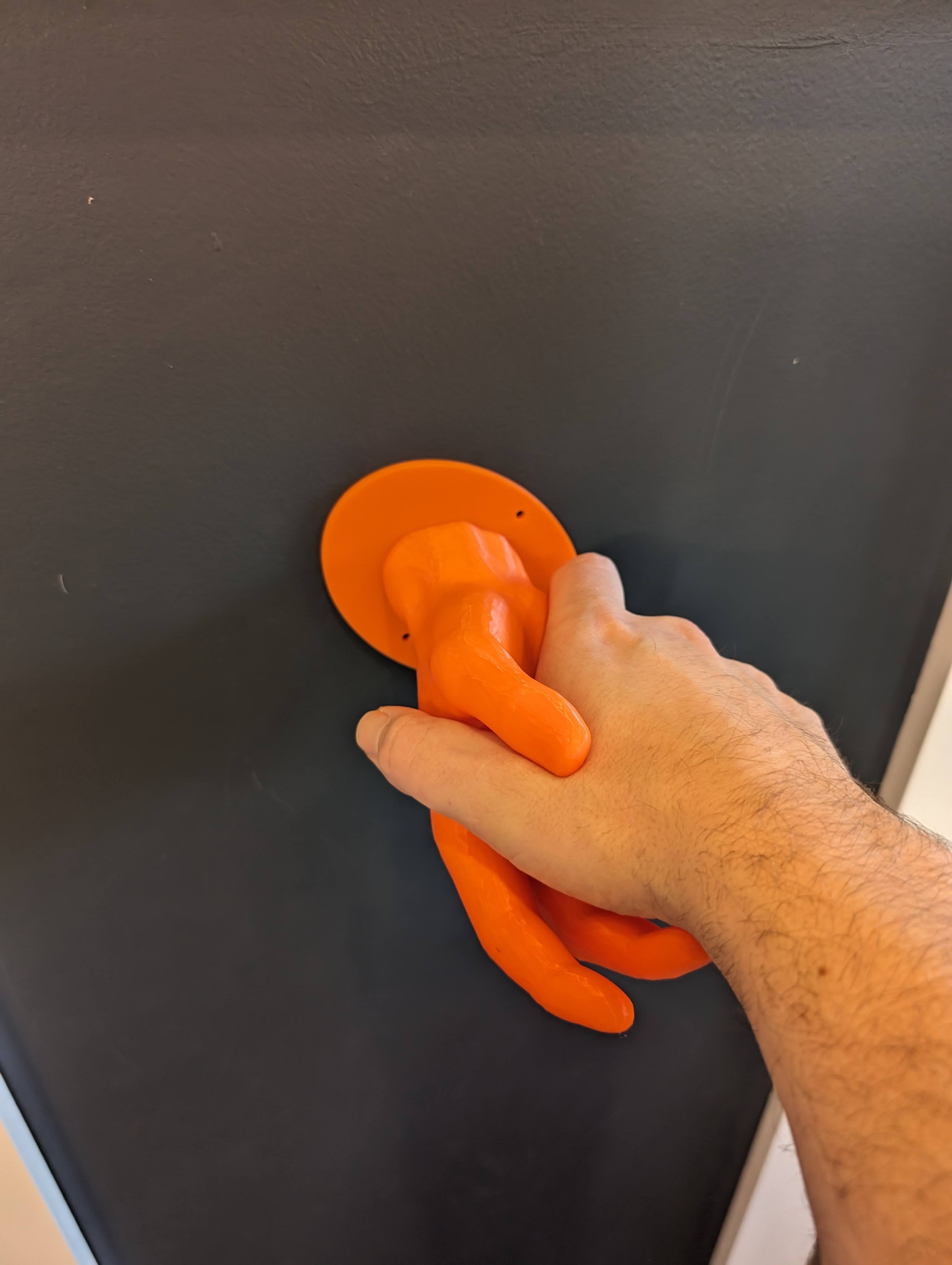 Soporte para auriculares en forma de mano montado en la pared