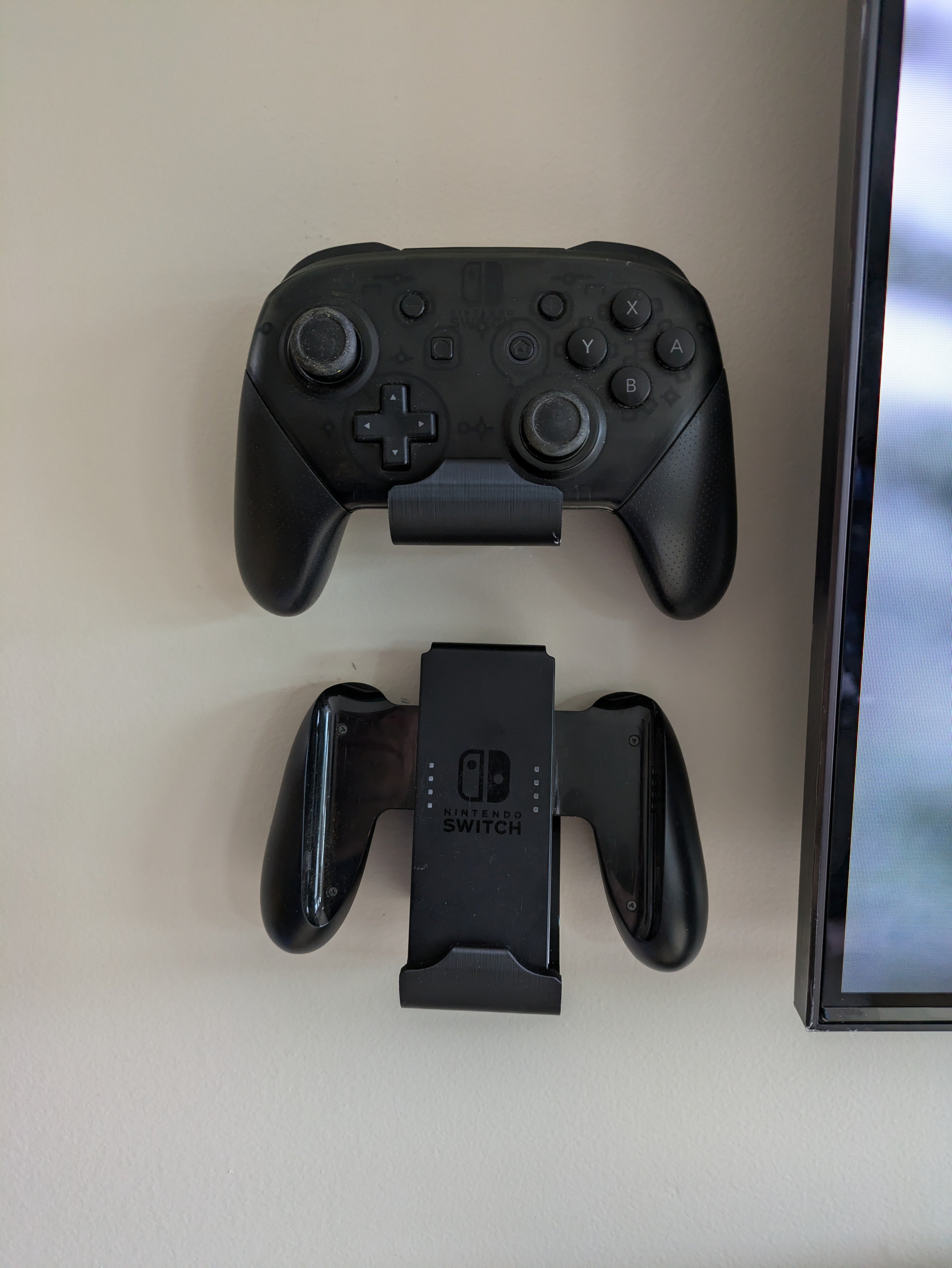 Soporte de pared para mando Nintendo Switch Pro - Distancia de 5 mm