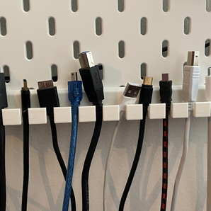 Soporte para cable USB Skadis