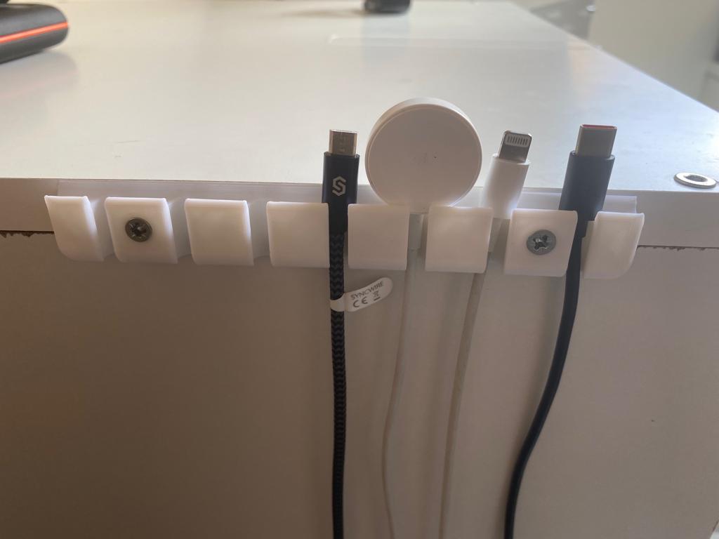 Soporte y organizador de cables USB