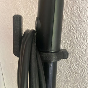 Práctica percha para cable para mopa a vapor y aspiradora