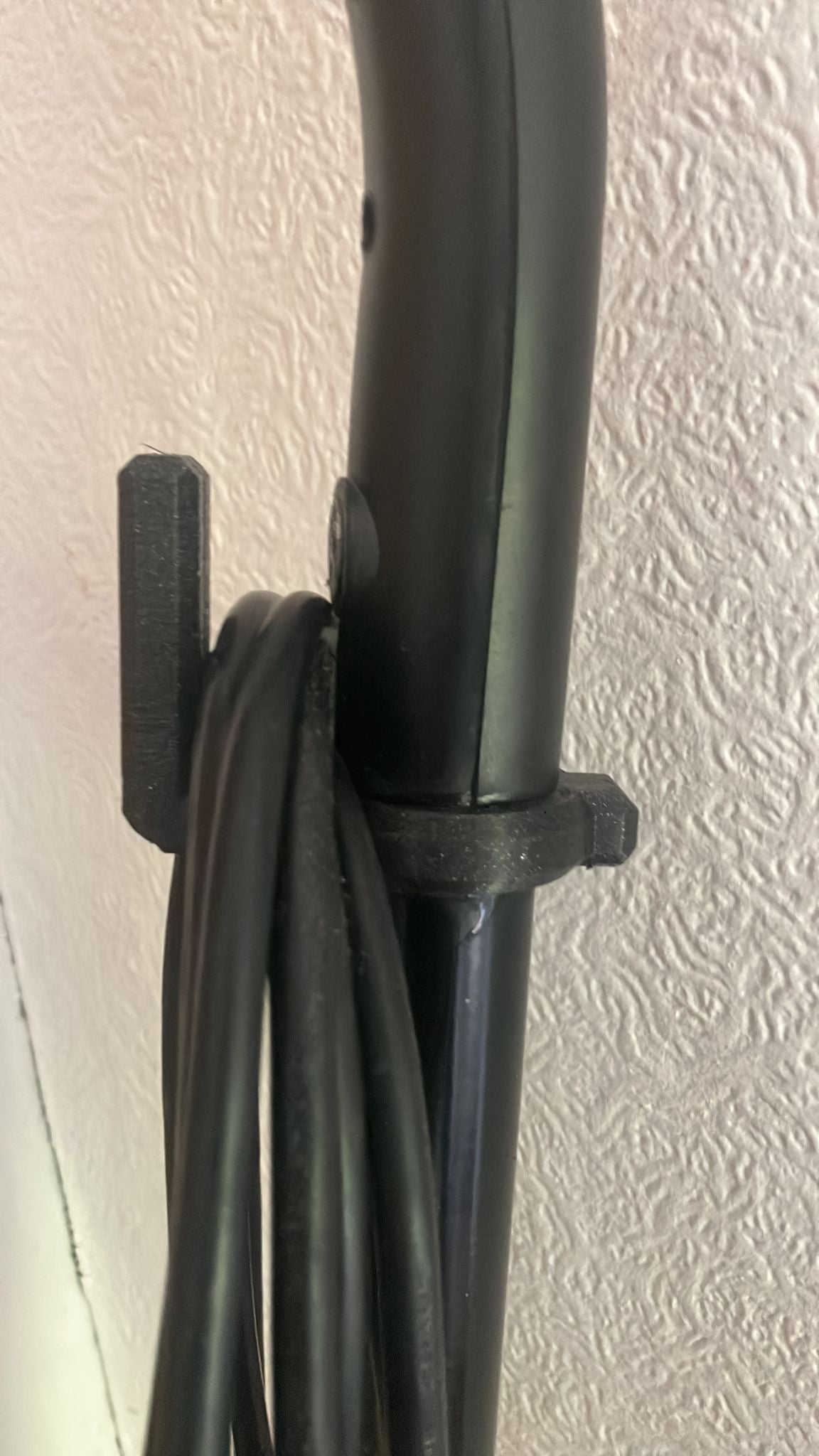Gancho de cable para mopa de vapor/aspiradora