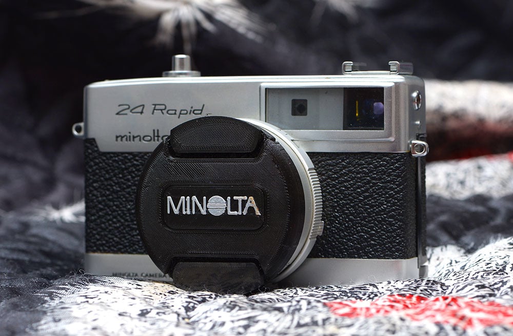 Tapa de lente de cámara de 54 mm para NIKON / CANON / MINOLTA / Todos los modelos