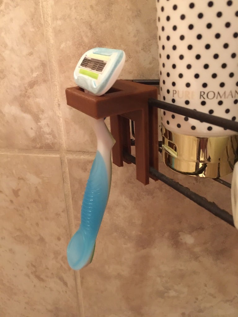 Soporte para maquinilla de afeitar para el organizador de la ducha.