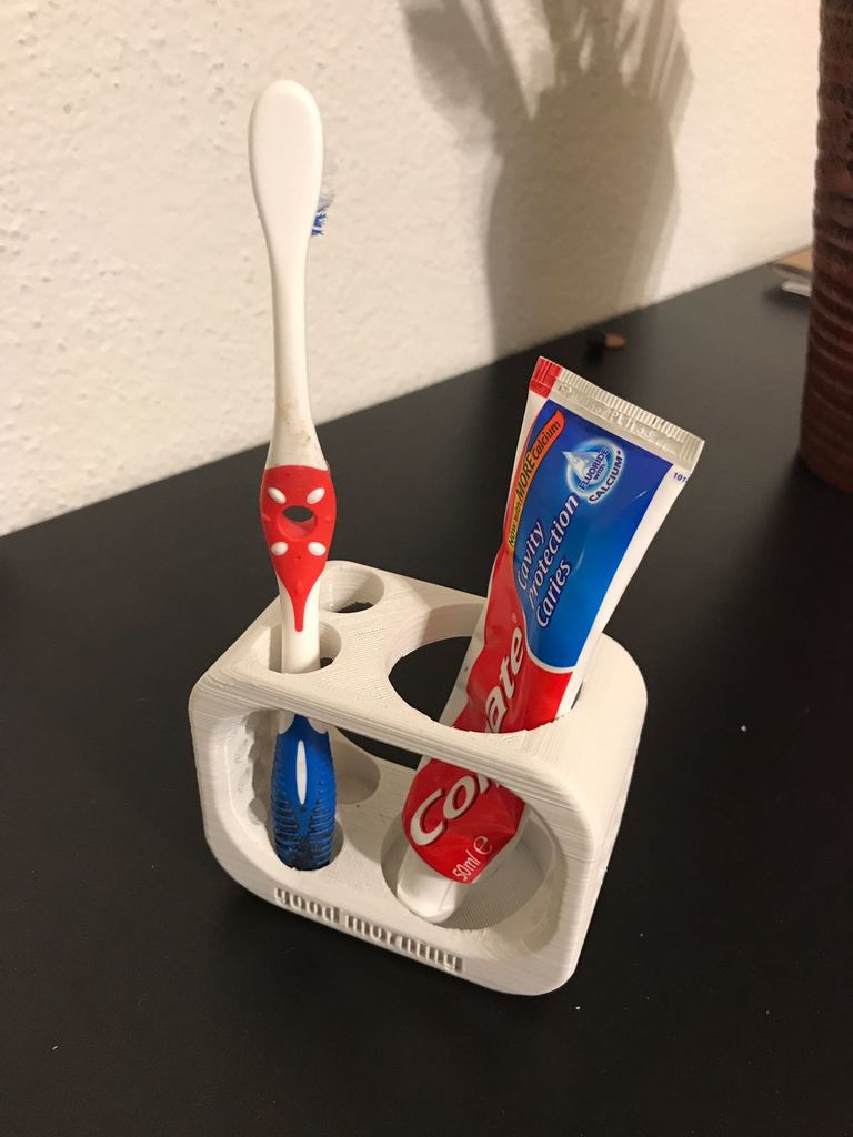 Soporte para cepillos de dientes y pasta de dientes para 2 cepillos de dientes.